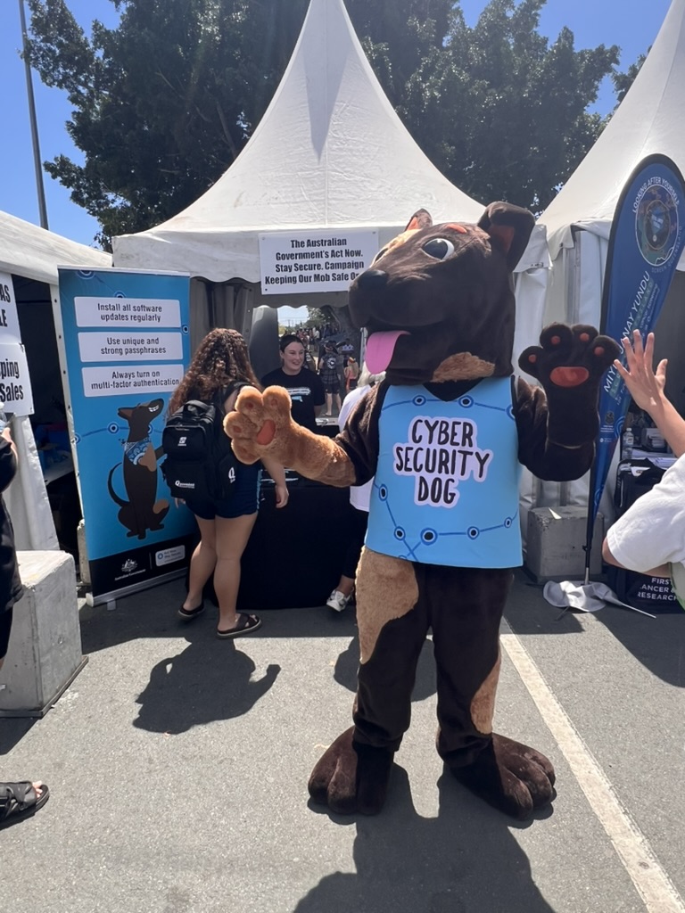 Cyber Security Dog in front of the tent