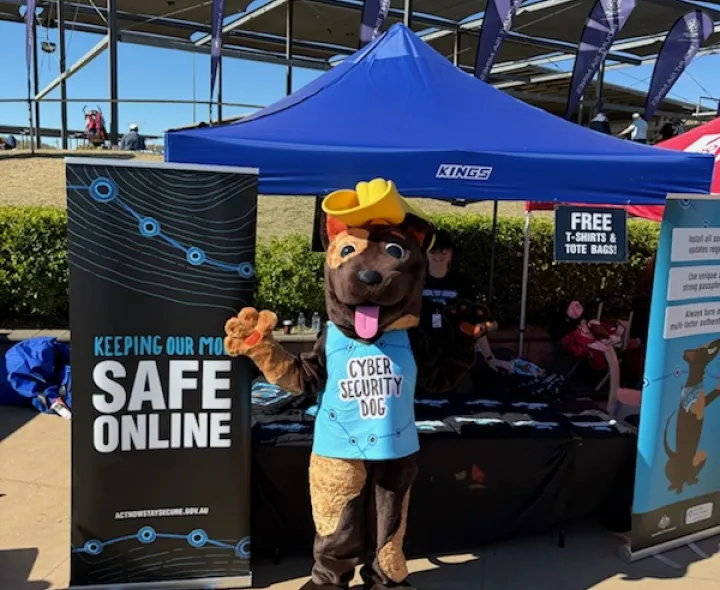 Cyber Security Dog outside his display tent